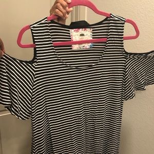 Black and white shoulder cut out top.